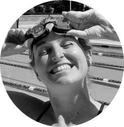 Triathlete smiling and testing smart swim goggles